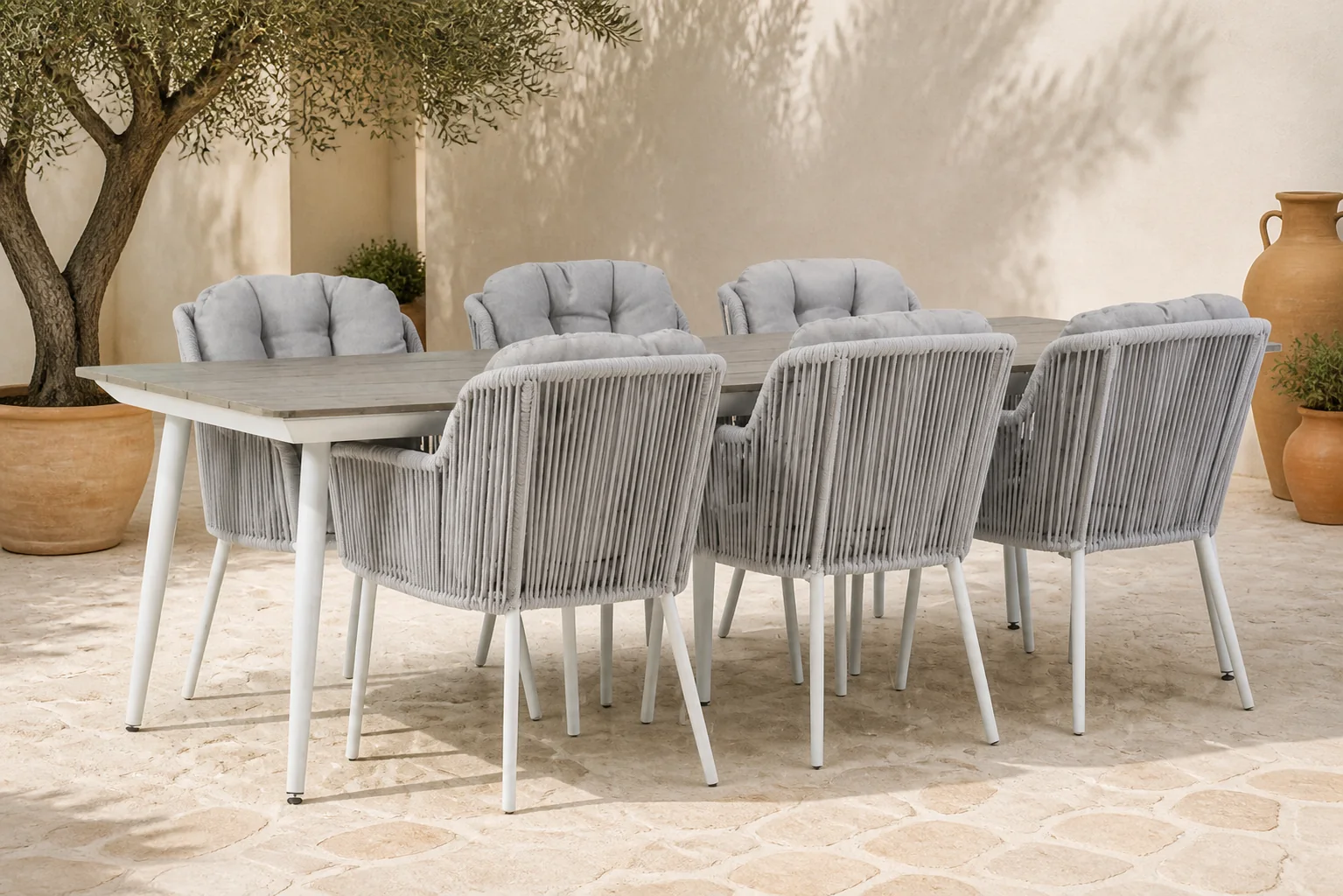 Sfeerfoto van Santika Furniture Tendenza/Yala 240 cm dining tuinset 7-delig – Wit