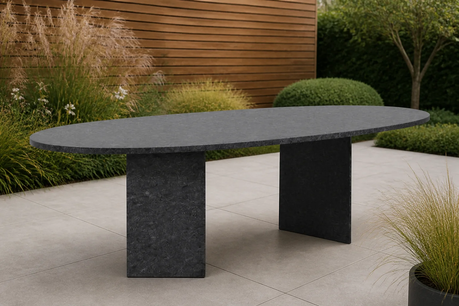 Sfeerfoto van Garden Collections Graniet dining tuintafel ovaal 240 x 120 cm – Grijs-antraciet