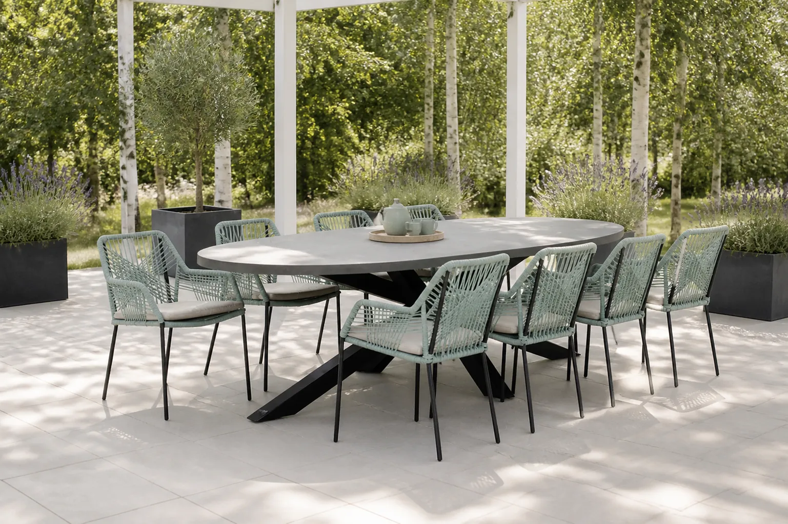 Sfeerfoto van BUITEN living Stockholm/Seville mint dining tuinset | 8 personen | betonlook + touw | 280cm ovaal – Zand