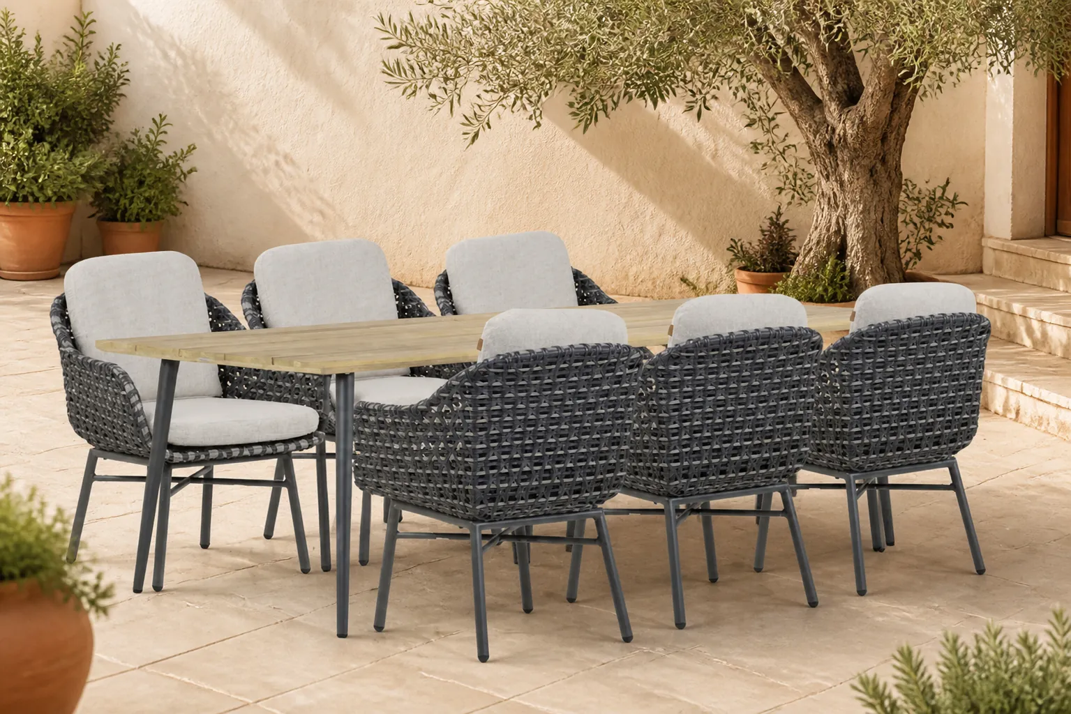 Sfeerfoto van Santika Furniture Yovan/Montana 240 cm dining tuinset 7-delig – Grijs-antraciet