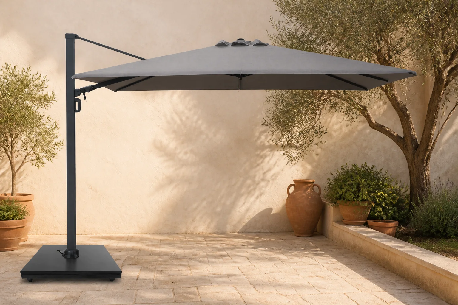 Sfeerfoto van Camello Luna zweefparasol 2.6×3.5m Concrete (excl. voet) – Grijs-antraciet