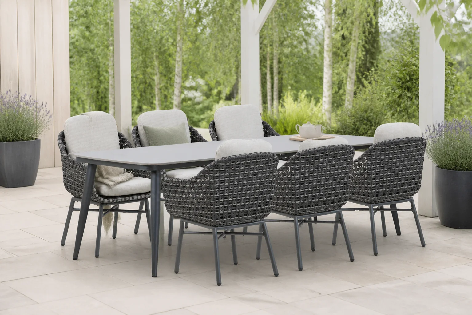 Sfeerfoto van Santika Furniture Yovan/Vienna 240 cm dining tuinset 7-delig – Grijs-antraciet