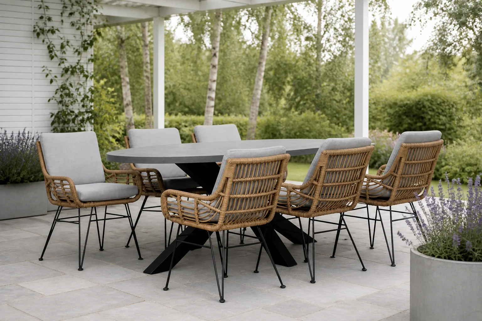 Sfeerfoto van BUITEN living Stockholm/Carlos taupe dining tuinset | 6 personen | betonlook + wicker | 200cm ovaal – Zwart