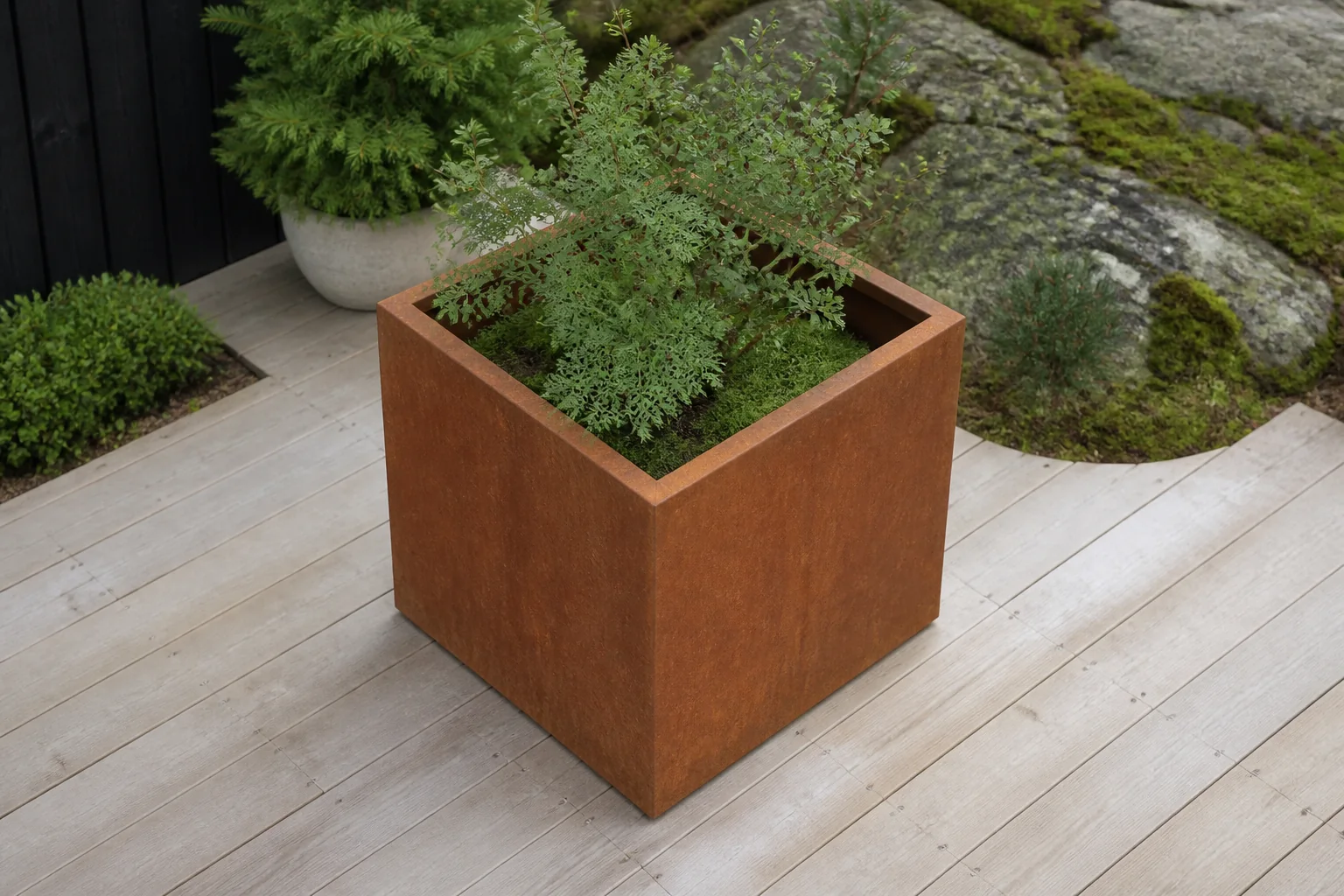 Sfeerfoto van Geroba Quadra vierkante plantenbak cortenstaal L80 x B80 x H80 cm – bruin