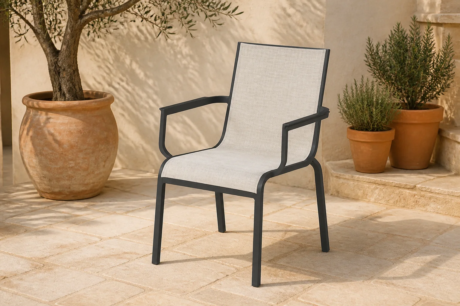 Sfeerfoto van Hartman Gina Alu Sling stackable arm chair I