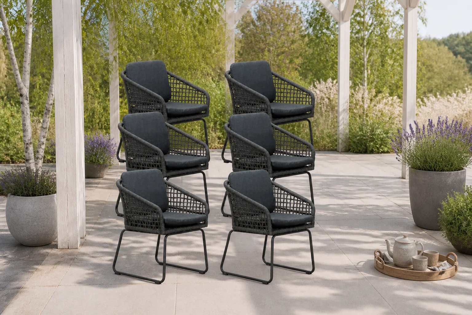 Sfeerfoto van BUITEN living Tulum dining tuinstoel set van 8 | touw + aluminium | Lava Grey – Antraciet