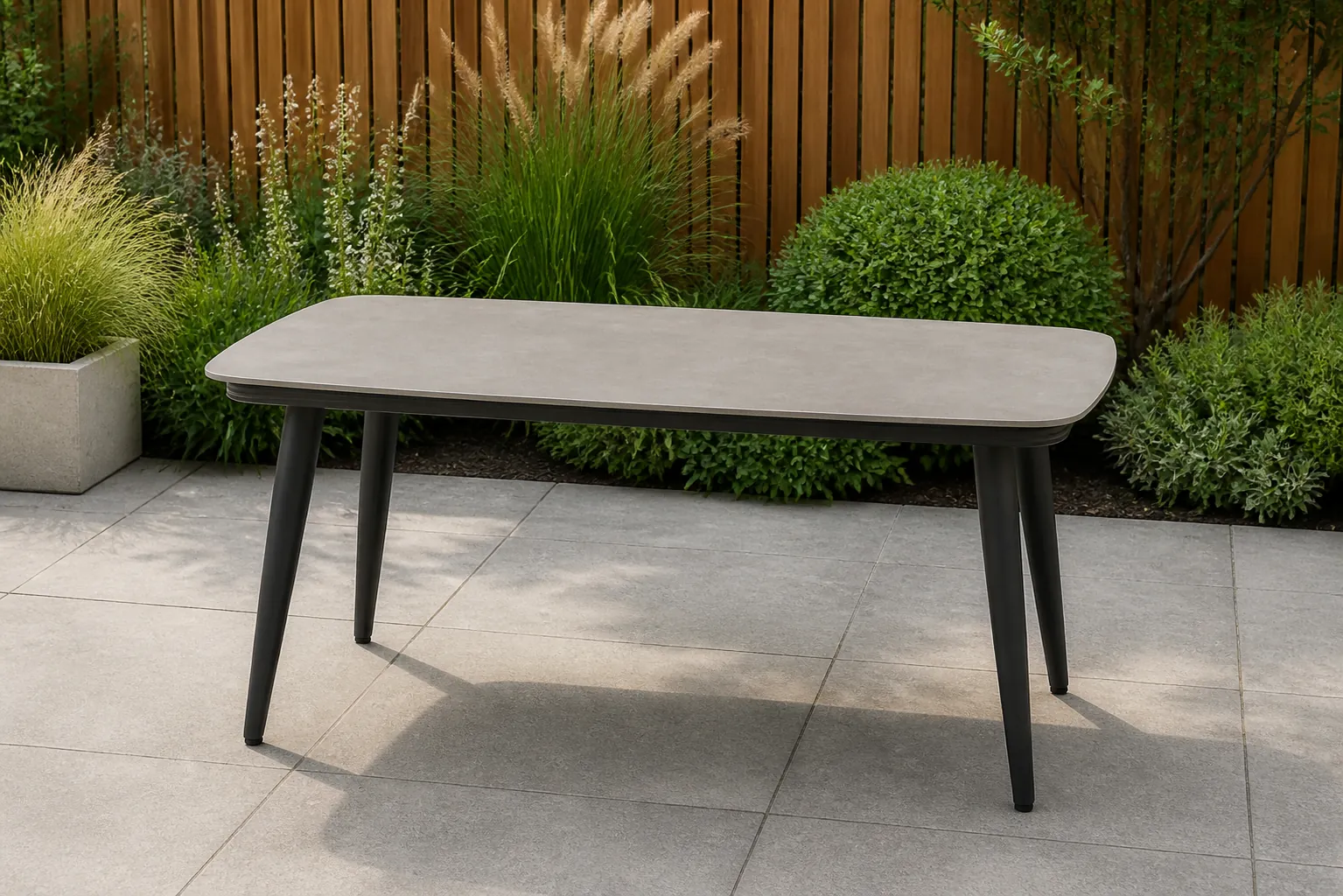 Sfeerfoto van Coco Ibiza lounge/dining tuintafel 140 x 80 cm – Grijs-antraciet