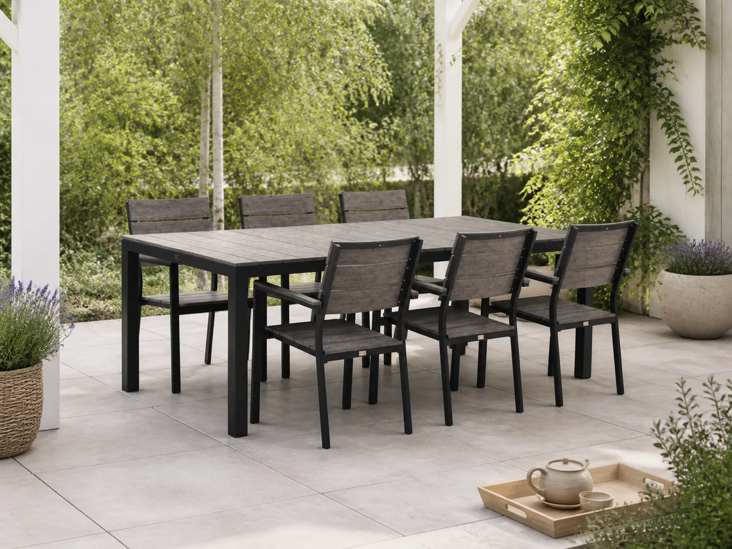 Sfeerfoto van Bellagio tuinmeubelen Fidenza 220cm dining tuinset 7-delig stapelbaar – Zwart