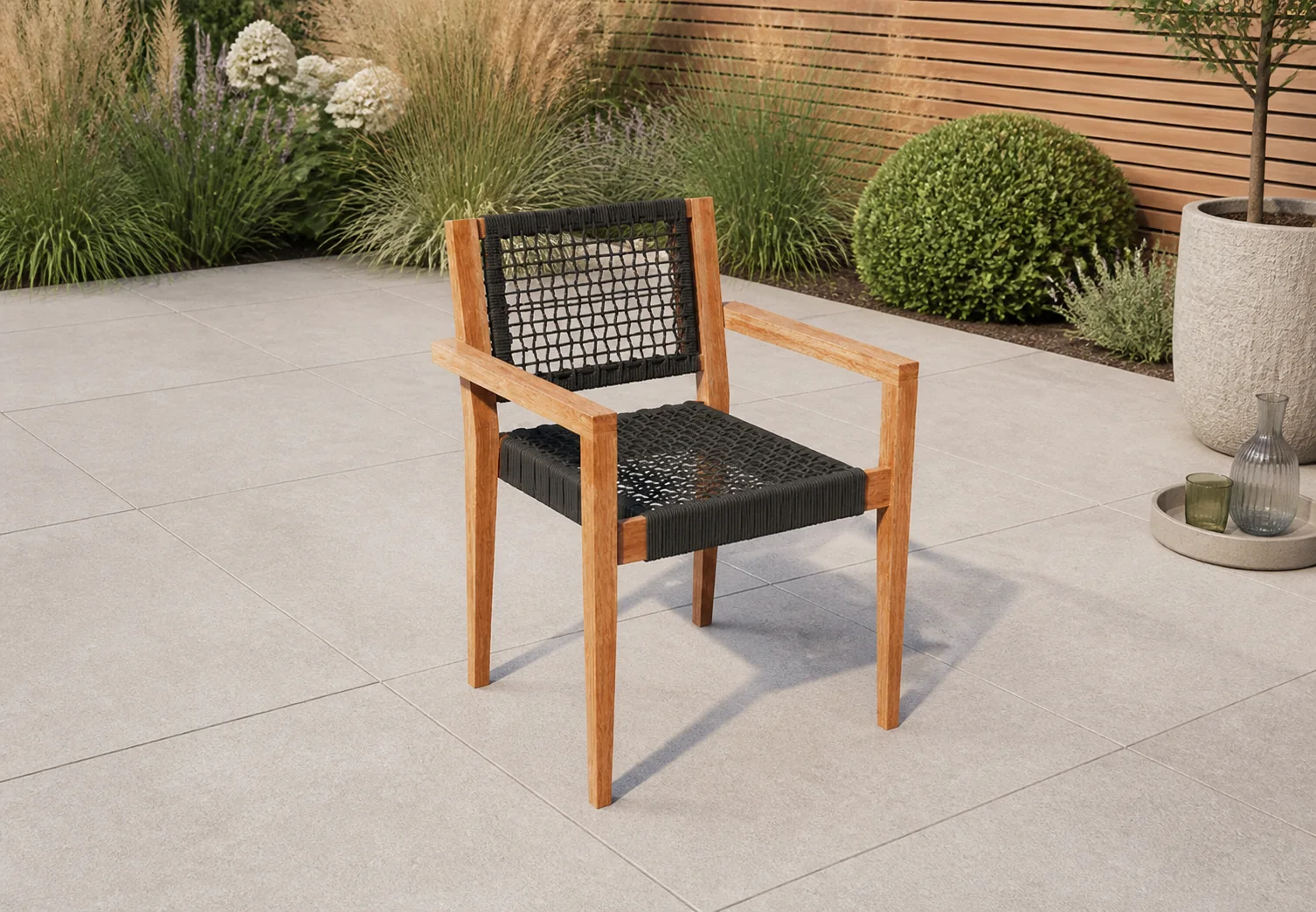 Sfeerfoto van Tuindeco Teak stapelbare tuinstoel Toledo (set van 2 stoelen) – hout